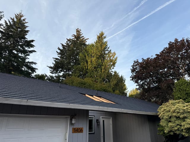 Black Interlock metal roof in Tigard, OR