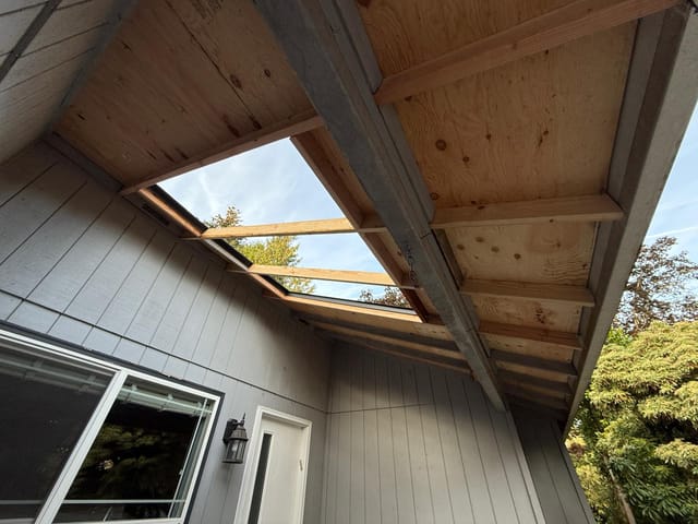 Black Interlock metal roof in Tigard, OR