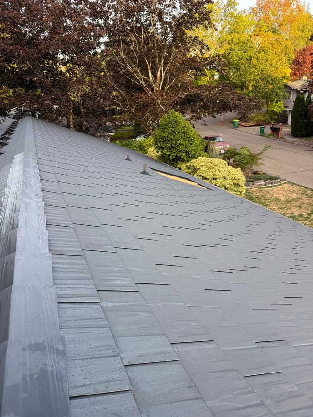 Black Interlock metal roof in Tigard, OR