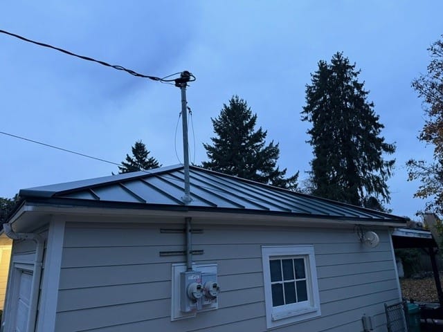 Hunter Green Interlock metal roof in Portland, OR