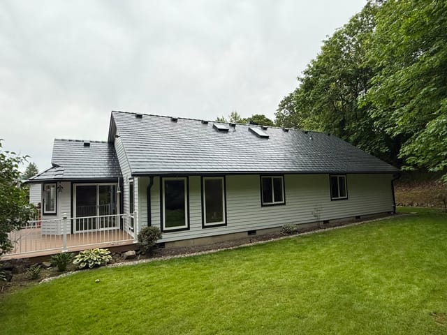 Black Interlock metal roof in Newberg, OR