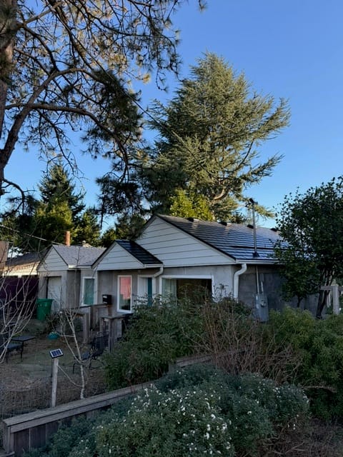 Black Interlock metal roof in Portland, OR