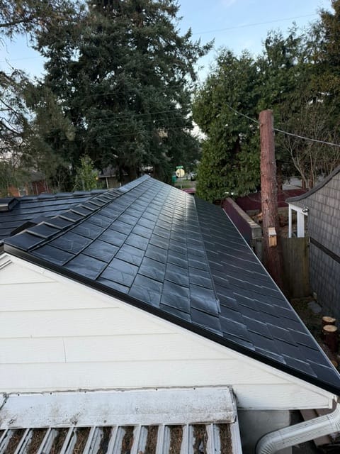 Black Interlock metal roof in Portland, OR