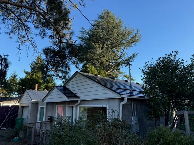 Black Interlock metal roof in Portland, OR