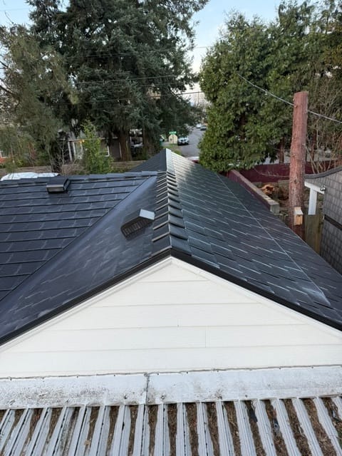 Black Interlock metal roof in Portland, OR