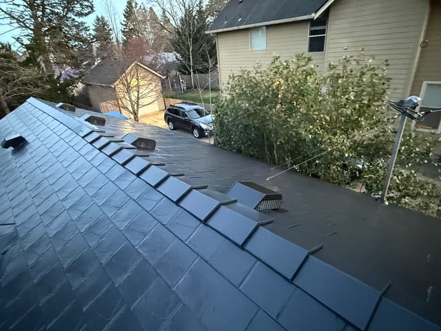 Black Interlock metal roof in Portland, OR