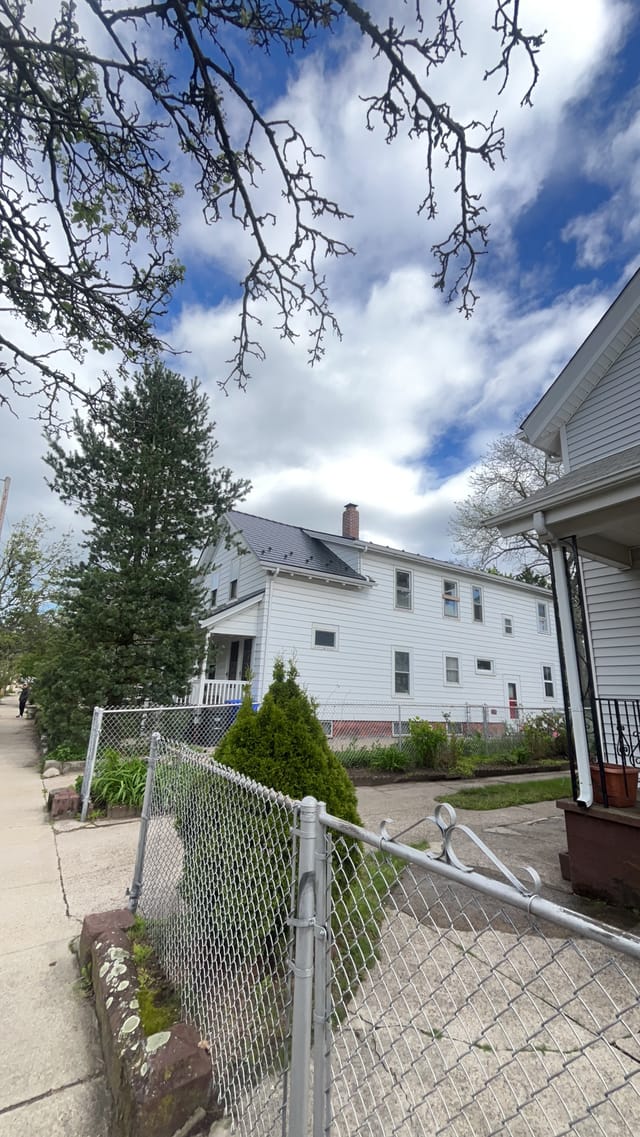 Black Interlock metal roof in Pawtucket, RI