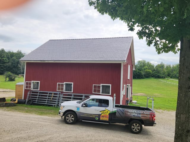 Tudor Brown Interlock metal roof in Brandon, VT