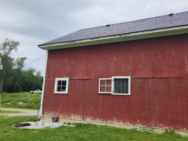 Tudor Brown Interlock metal roof in Brandon, VT