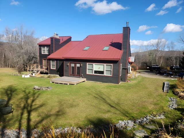 Tile Red Interlock metal roof in Dover, VT