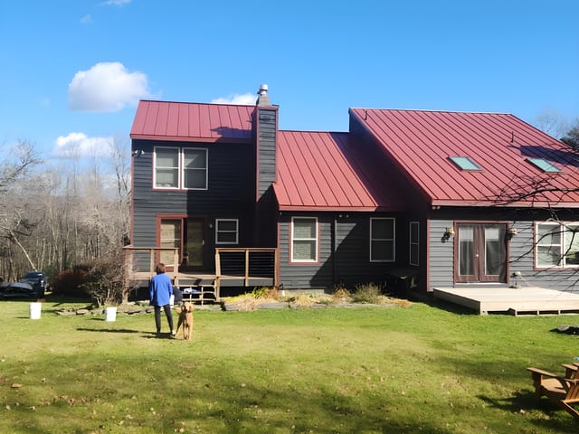 Tile Red Interlock metal roof in Dover, VT