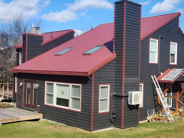 Tile Red Interlock metal roof in Dover, VT