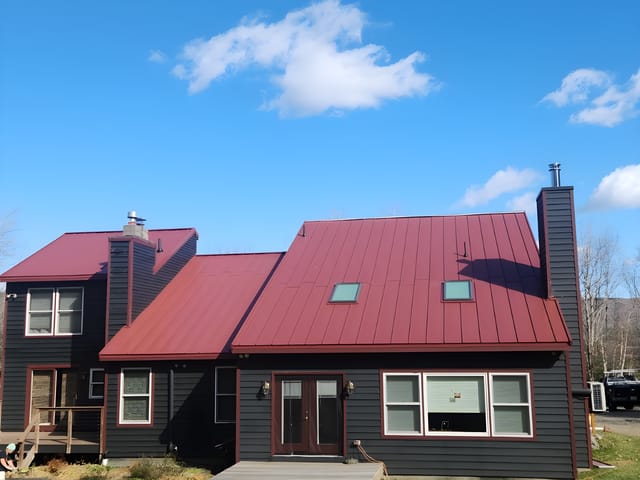 Tile Red Interlock metal roof in Dover, VT