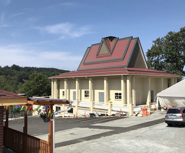 Tile Red Interlock metal roof in Seattle, WA