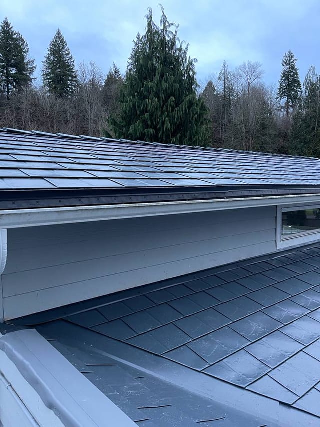 Deep Charcoal Interlock metal roof in Maple Valley, WA