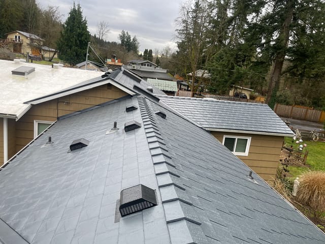Deep Charcoal Interlock metal roof in Maple Valley, WA