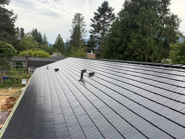 Black Interlock metal roof in North Bend, WA