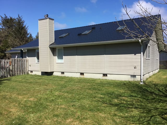 Black Interlock metal roof in Ocean Shores, WA