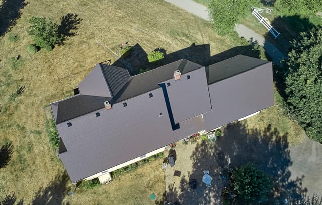 Tudor Brown Interlock metal roof in Longview, WA