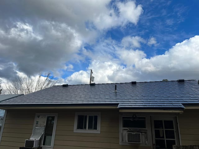 Deep Charcoal Interlock metal roof in Vancouver, WA