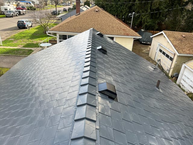 Deep Charcoal Interlock metal roof in Vancouver, WA