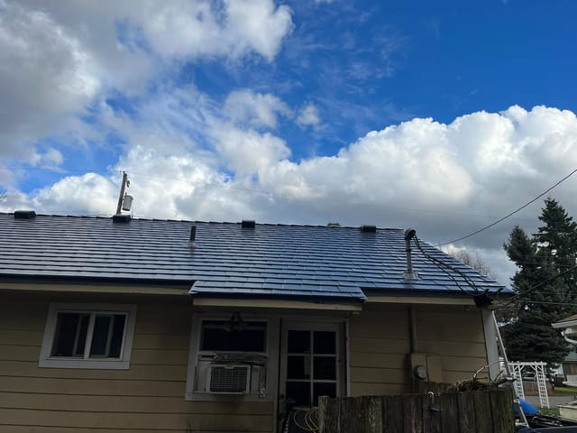 Deep Charcoal Interlock metal roof in Vancouver, WA