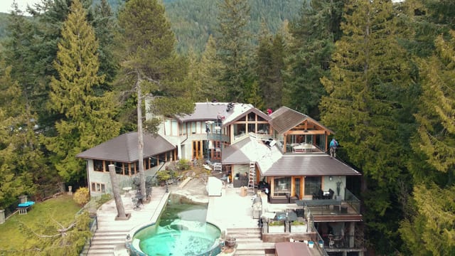 Completed Interlock aluminum Tudor Brown slate roof on a West Vancouver, BC home, a 66-square installation.