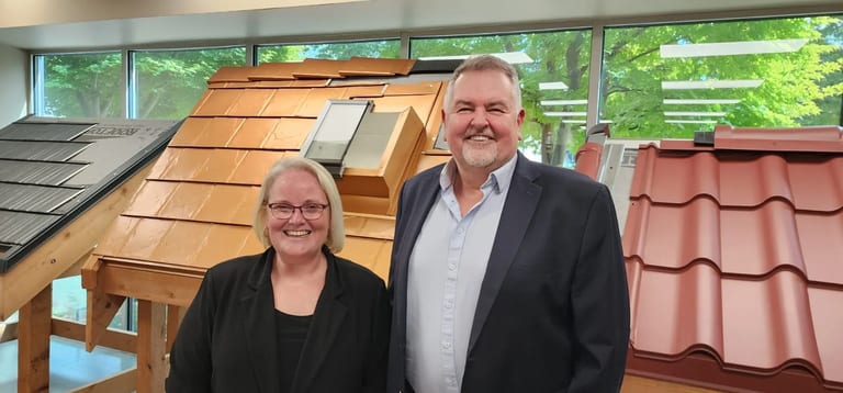 Minister Jill McKnight touring Interlock Roofing's Delta, BC aluminum manufacturing facility