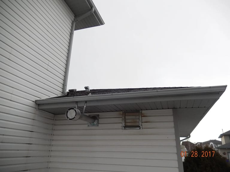 Deep Charcoal Interlock Slate aluminum roof on a single-family home with a metal roof in a rural suburban, Fort Saskatchewan, Alberta