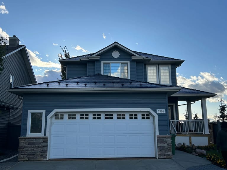 Black Interlock Slate aluminum roof on a two-storey home with a metal roof in Beaumont, Alberta, Beaumont, Alberta