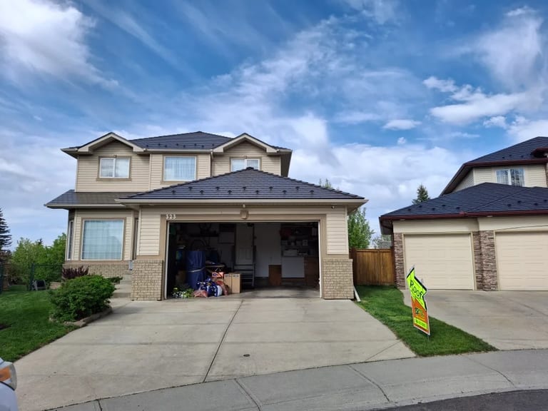 Tudor Brown Interlock Slate aluminum roof on a Tudor home with dormers on a mountain in rural Alberta, Calgary, Alberta