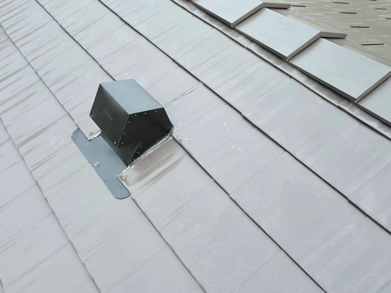 Interlock Aluminum Cedar Shingle Metal Roofing – Tudor Brown | Rocky Mountain House, AB (Vent flashing detail)