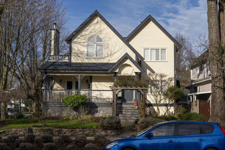 Deep Charcoal Interlock Slate aluminum roof on a two-storey modern home with a Deep Charcoal metal roof, Vancouver, British Columbia