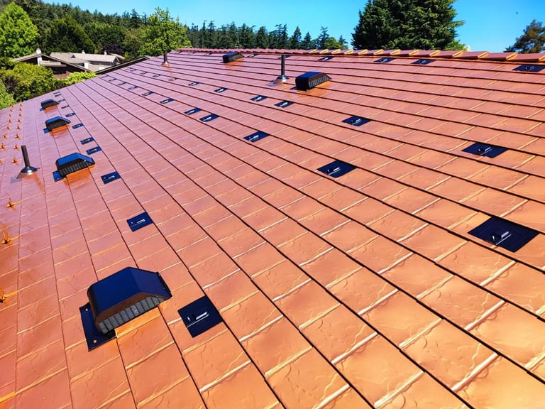Copper Penny Interlock Slate aluminum roof on a copper penny metal roof on a single-family home in a, Victoria, British Columbia