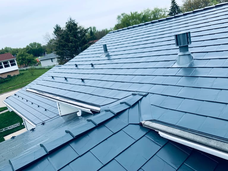 Deep Charcoal Interlock Slate aluminum roof on a single-family home with Interlock Slate aluminum roof in, Elgin, Illinois