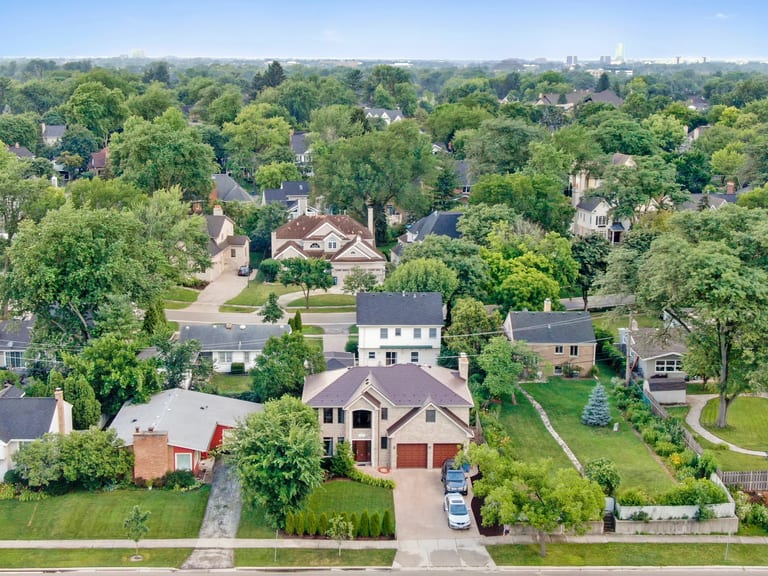 Colonial Brown Interlock Slate aluminum roof on a Colonial style home with a Colonial Brown metal roof in a, Calredon Hills, Illinois