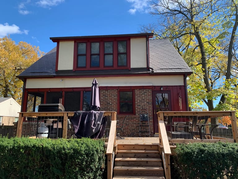 Tudor Brown Interlock Slate aluminum roof on a Tudor home with a brown Interlock metal roof in a, Elmhurst, Illinois