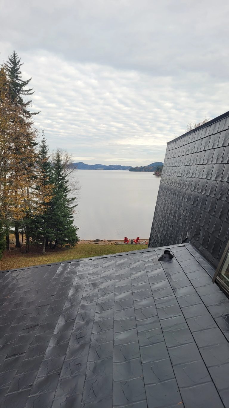 Black Interlock Slate aluminum roof on a waterfront home with a modern roof in Utopia, New, Utopia, New Brunswick
