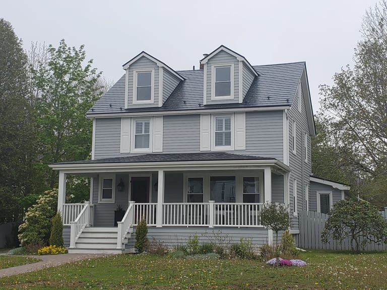 Black Interlock Slate aluminum roof on the home, Mahone Bay, Nova Scotia