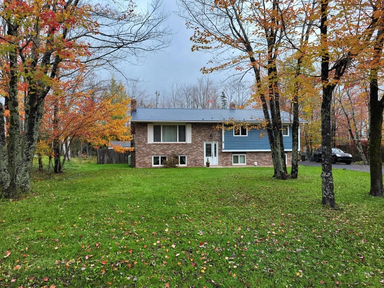 Deep Charcoal Interlock Cedar Shingle aluminum roof on the home, Lantz, Nova Scotia