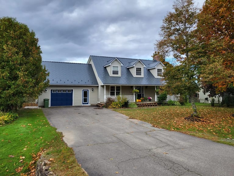 Deep Charcoal Interlock Slate aluminum roof on the home with roof louver and ridge cap, Kentville, Nova Scotia