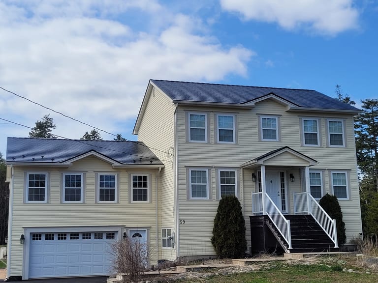 Black Interlock Slate aluminum roof on the home, Hammonds Plains, Nova Scotia