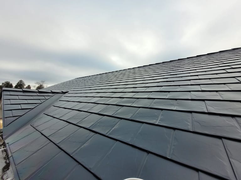 Black Interlock Slate aluminum roof on the home, Hammonds Plains, Nova Scotia