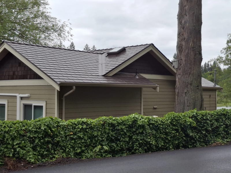 Colonial Brown Interlock® Slate aluminum shingle roof in Shawnigan Lake, BC (front-left view), installed by Interlock Metal Roofing (BC) Ltd.