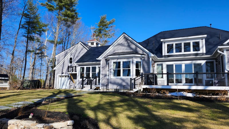 Deep Charcoal Interlock Slate metal roof on a home in Orrs Island, Maine.