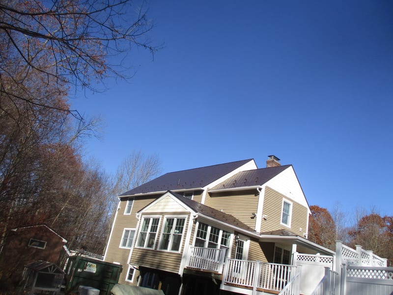 Colonial Brown Interlock Slate aluminum metal roof on a Massachusetts home in Rochdale