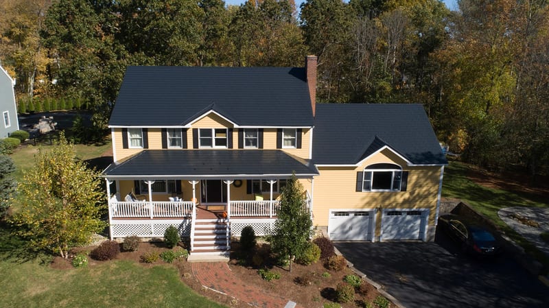 Black Interlock Slate aluminum metal roof on Reading, Massachusetts home with lifetime warranty.