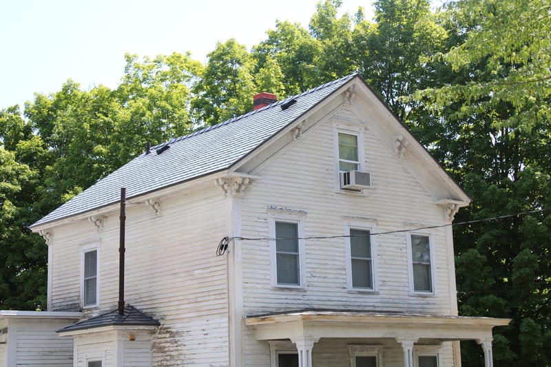 Musket Grey Interlock Slate metal roofing on a Fitchburg, Massachusetts home