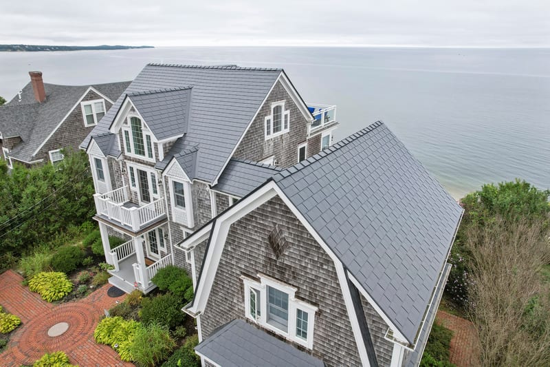 Deep Charcoal Interlock Slate metal roof on a coastal Massachusetts home in Sagamore Beach.