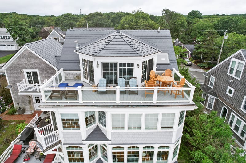 Deep Charcoal Interlock Slate metal roofing on a home in Sagamore Beach, Massachusetts.